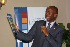 Hon. Henry Banzenzaki at the launch of the magazine "The Guide"