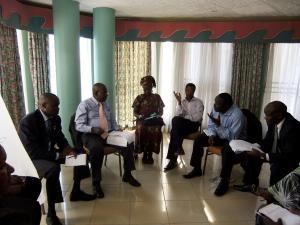 Members of the Democratic Party National Executive Committee conduct a group work session during the policy workshop at Ridar Hotel in Seeta - Mukono