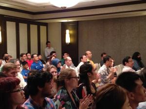 Audience members enjoying the panel discussion